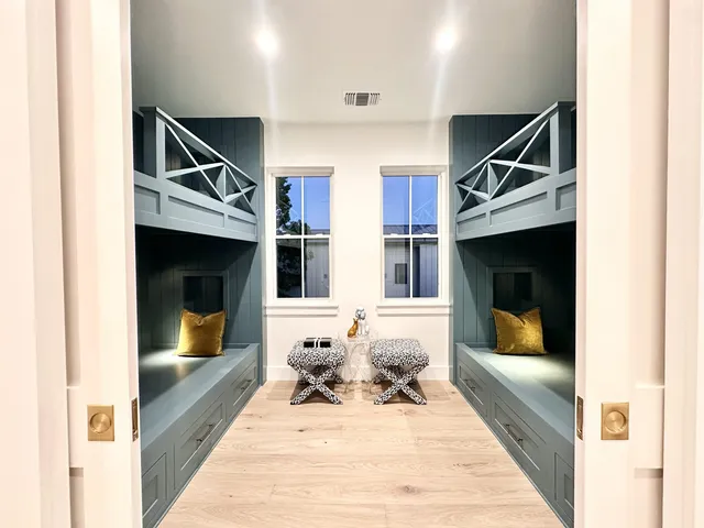 a bathroom with a granite countertop sink mirror and