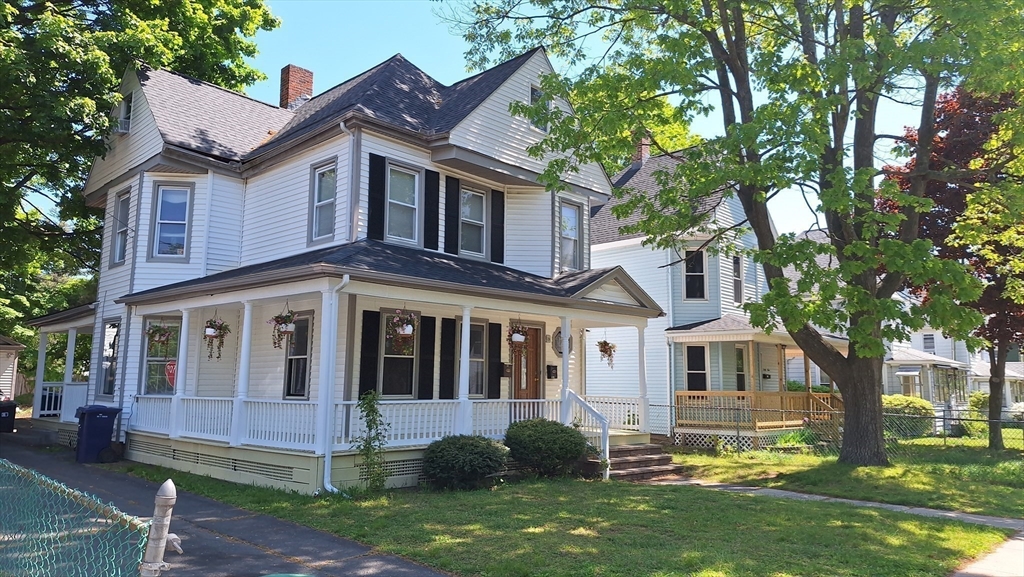 51 View Street Holyoke, MA 01040 - Photo 16 of 16 front view of a house with a yard