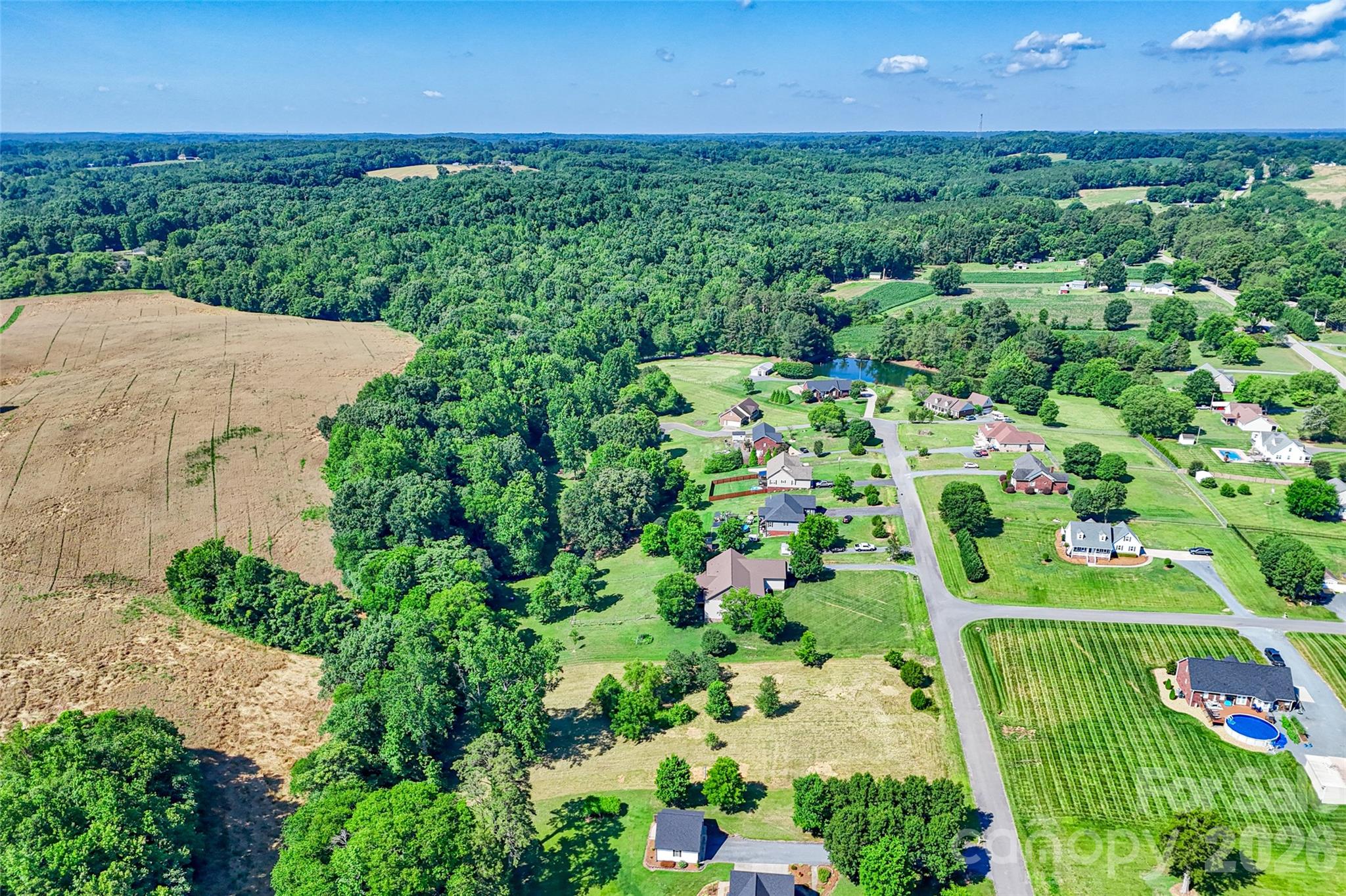 Lot 3 Crepts Branch Road, Unit 3 Locust, NC 28097 - Photo 32 of 36 a view of a garden with a building in the background