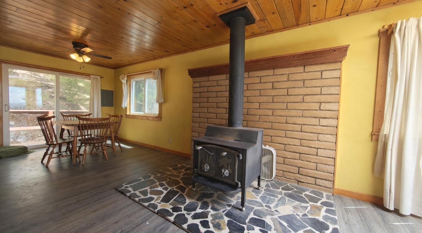 4850 8 Mile Road Camino, CA 95709 - Photo 7 of 30 a view of a dining room with furniture and wooden floor