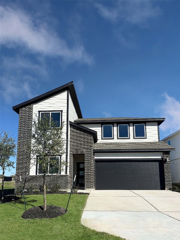 9709 Oxbow Strap Drive Austin, TX 78724 - Photo 4 of 26 a front view of a house with a yard