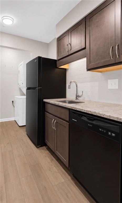1166 Booth Road, Unit 407 Marietta, GA 30008 - Photo 6 of 18 a kitchen with stainless steel appliances a refrigerator and a sink