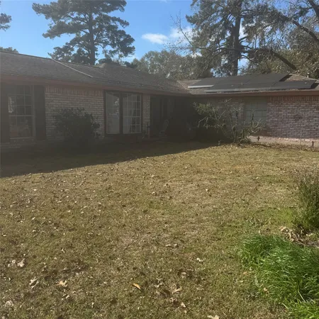 a view of wooden door and outdoor space