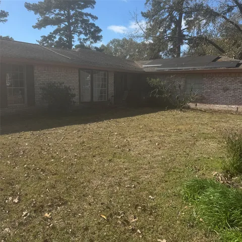 a view of wooden door and outdoor space