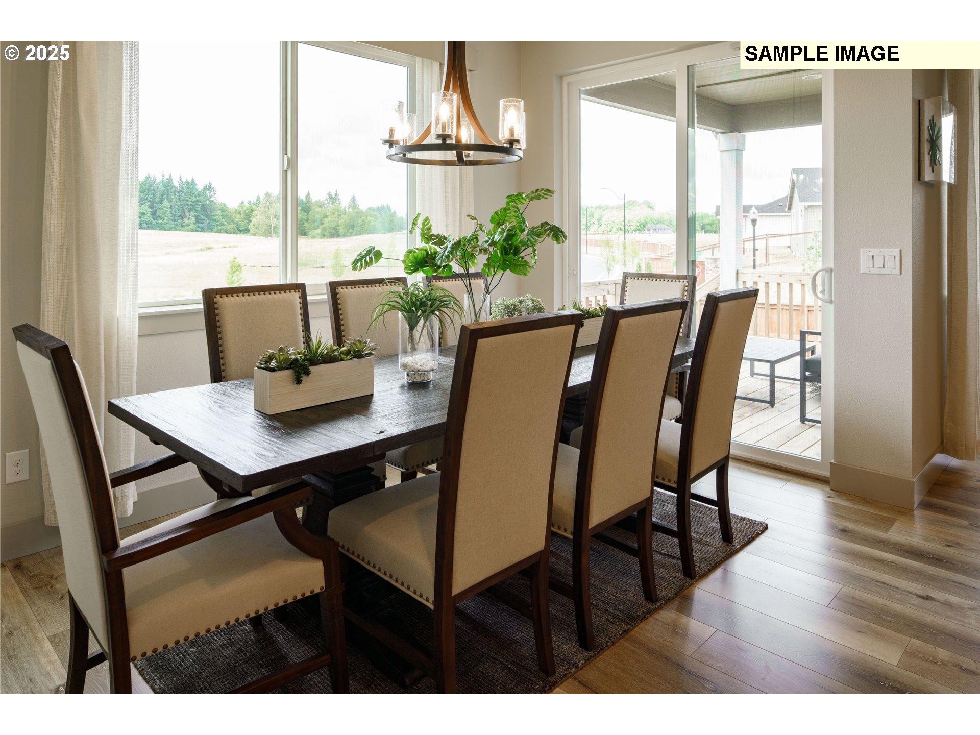2064 South River Road Kelso, WA 98626 - Photo 6 of 18 a view of a dining room with furniture window and wooden floor