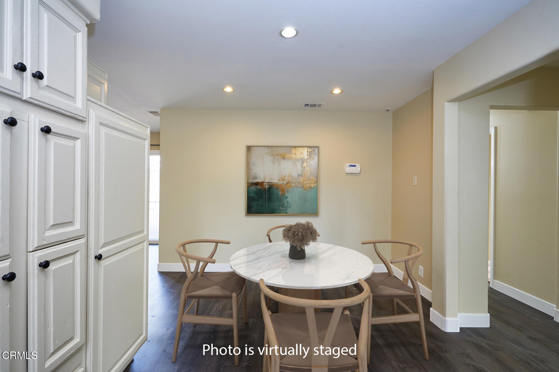 1700 Arlene Avenue Oxnard, CA 93036 - Photo 8 of 29 a view of a dining room with furniture and wooden floor