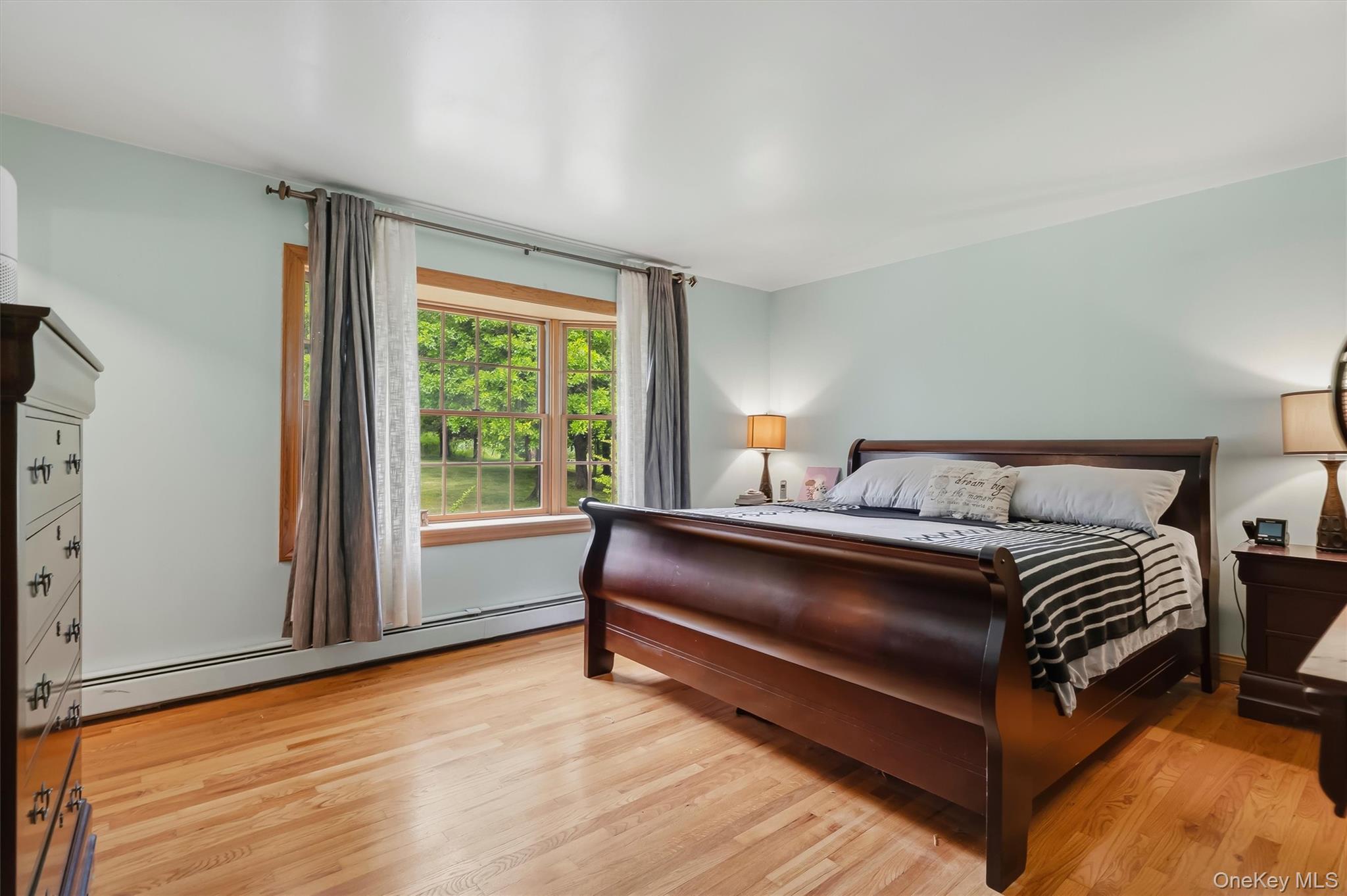 318 Beattie Road Washingtonville, NY 10992 - Photo 16 of 42 a bedroom with a bed and window