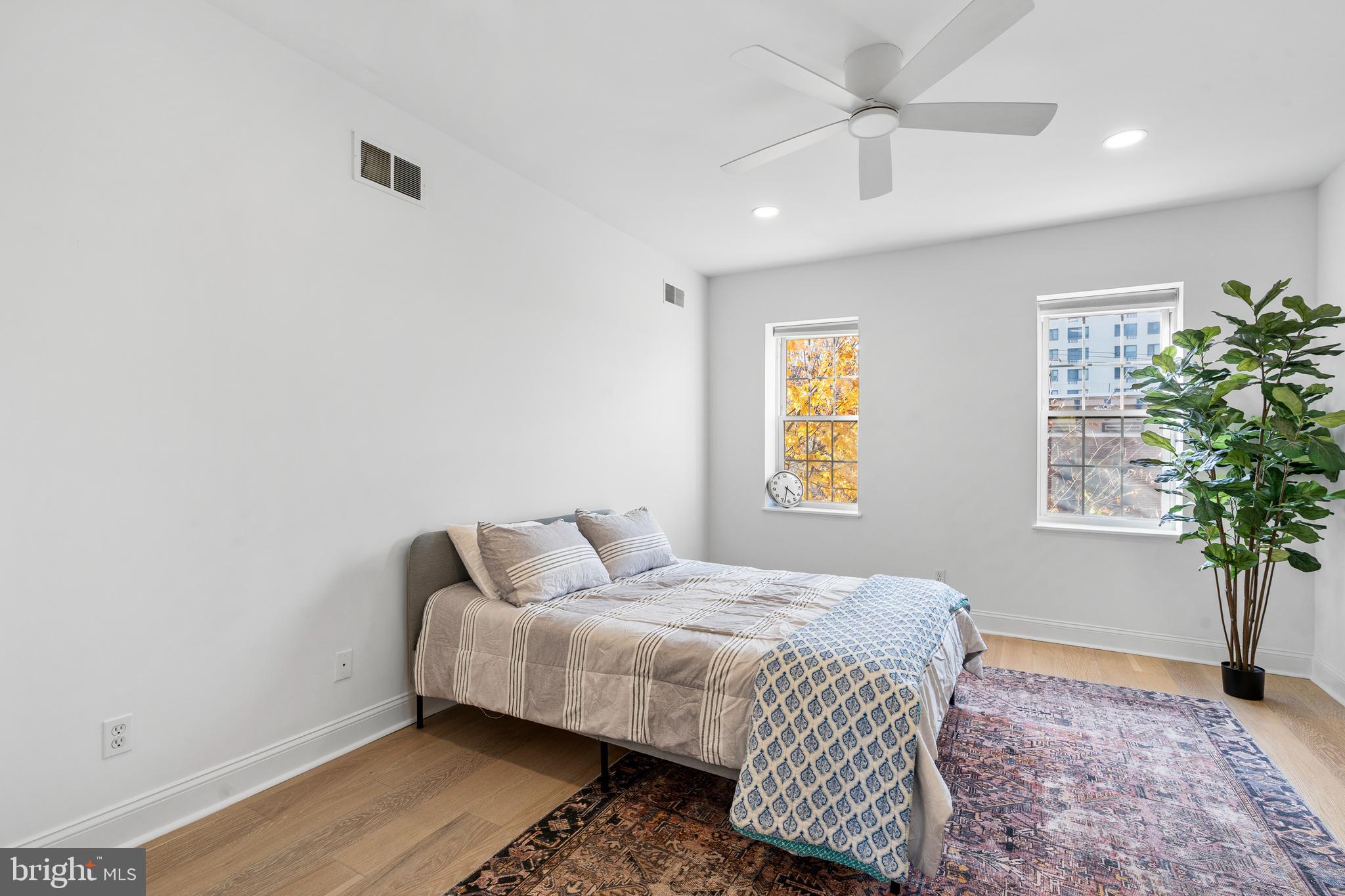 725 South 15th Street Philadelphia, PA 19146 - Photo 22 of 34 a bedroom with a bed and a window