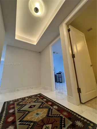 a view of a room with a large window