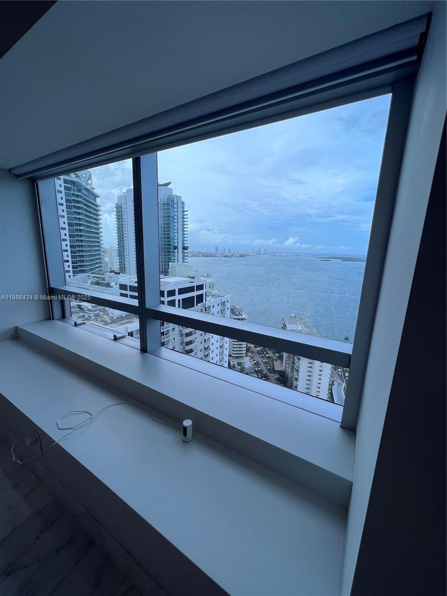 1435 Brickell Avenue, Unit 3307 Miami, FL 33131 - Photo 20 of 77 a view of barbecue area with wooden floor