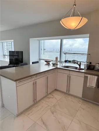 a view of a room with cabinets
