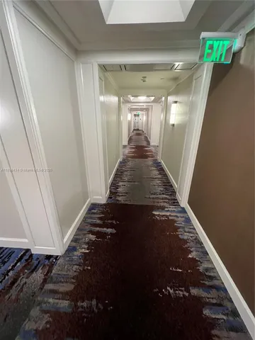 a bedroom with bed and window