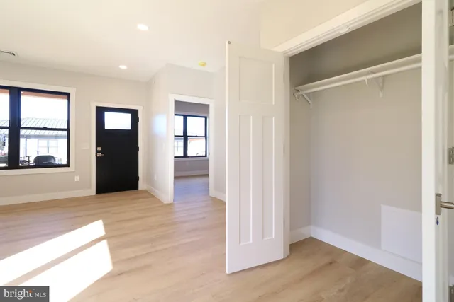 a front view of a house with a garage