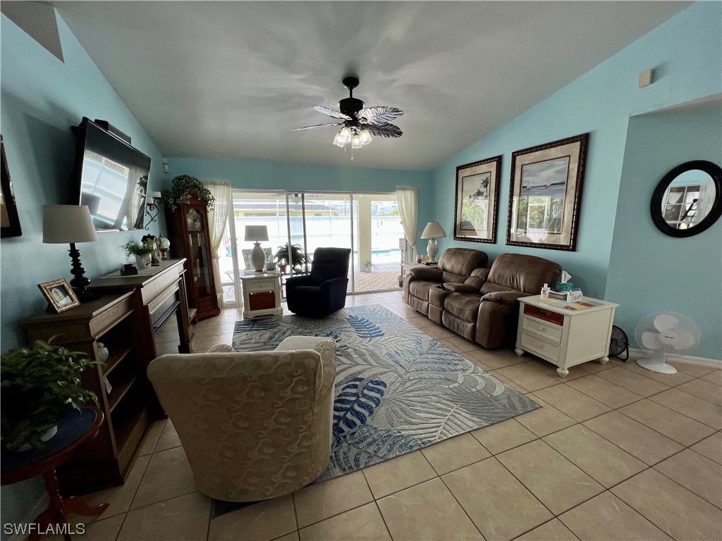 153 Patio Street Lehigh Acres, FL 33974 - Photo 11 of 27 a living room with furniture