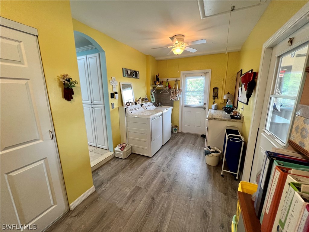 153 Patio Street Lehigh Acres, FL 33974 - Photo 22 of 27 a view of a room with gym equipment