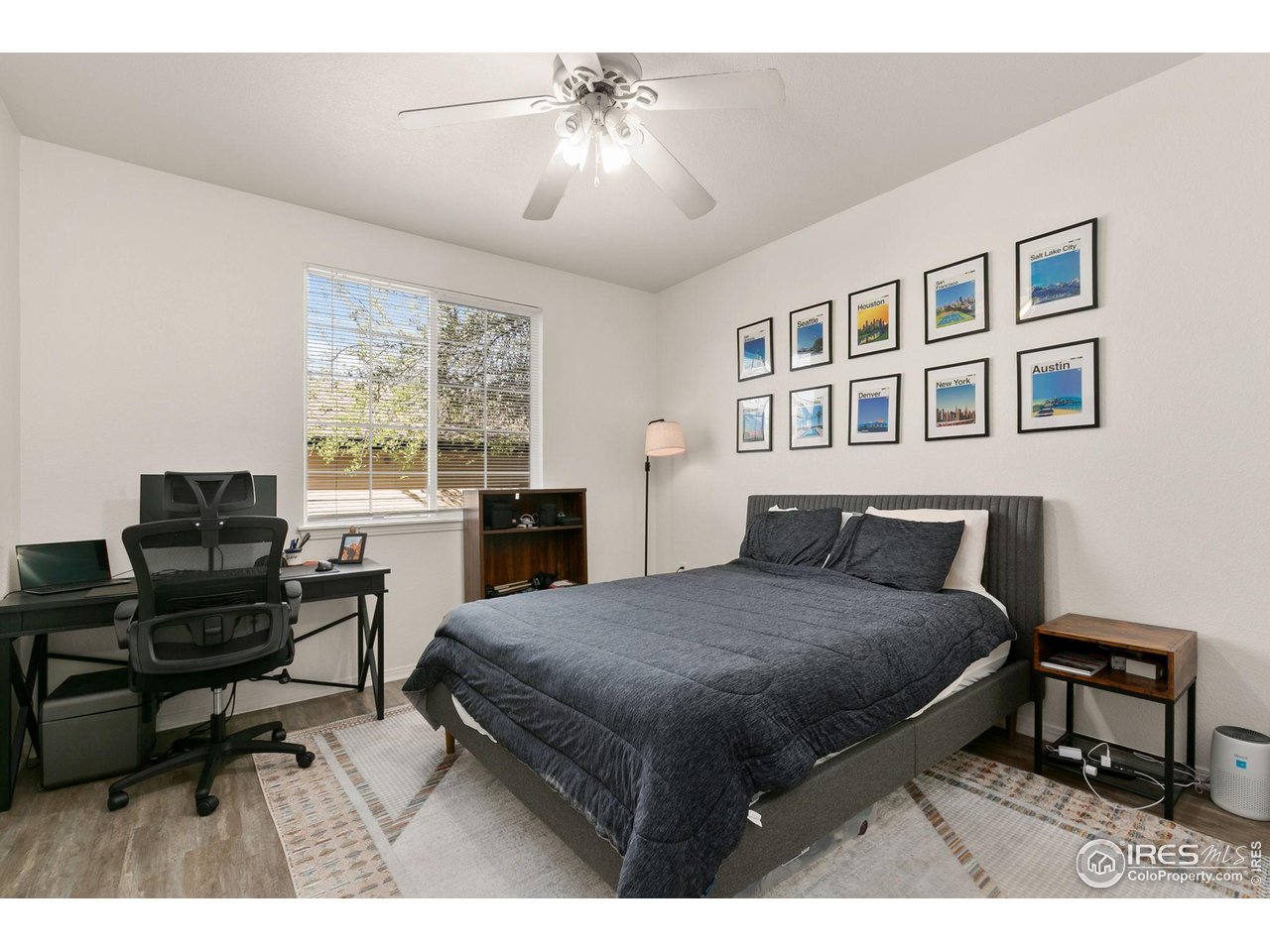 3002 West Elizabeth Street, Unit 1C Fort Collins, CO 80521 - Photo 8 of 15 a bedroom with a bed and a piano table