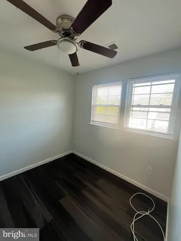 en empty room with windows