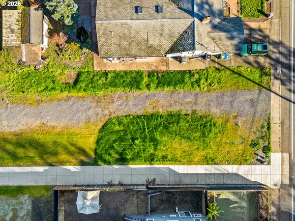 a swimming pool with outdoor seating and yard