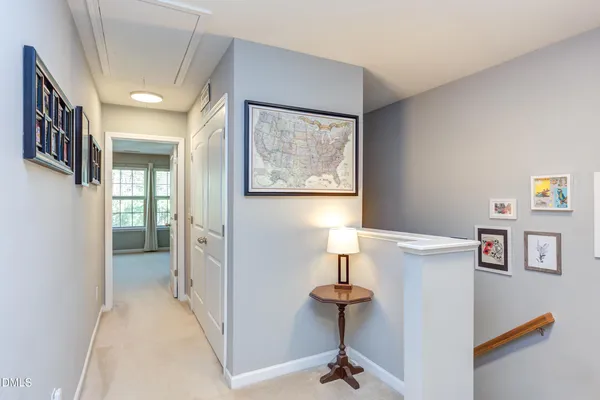 a view of hallway with furniture and entryway