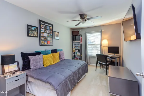 a bedroom with a bed and furniture