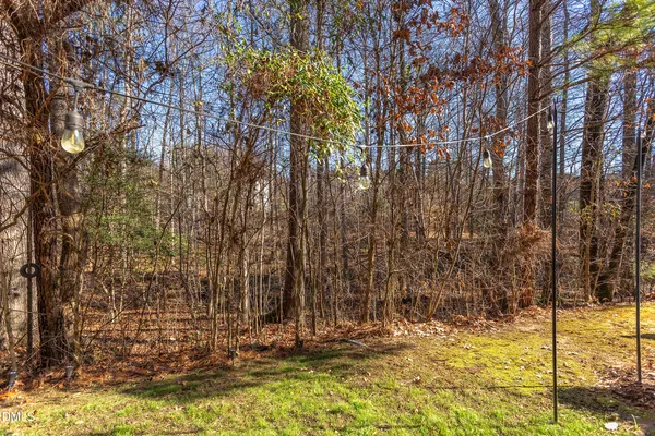 a view of a backyard of the house