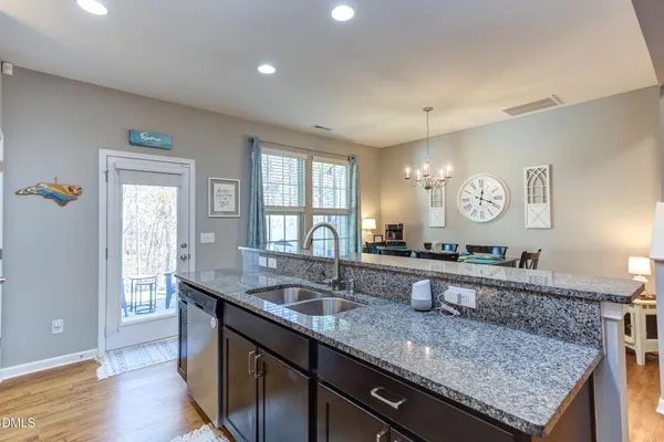 a kitchen with lots of counter space and window