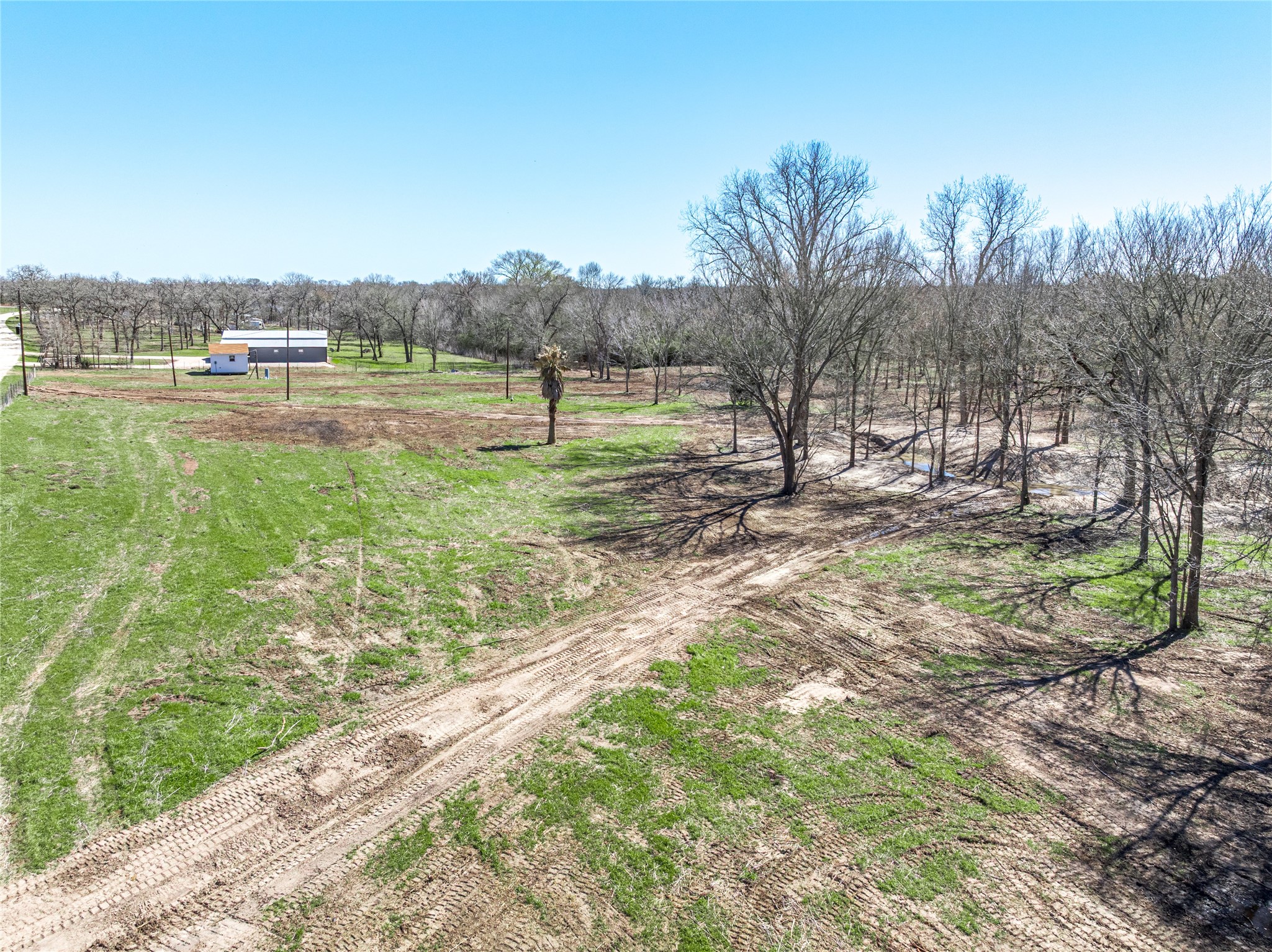 4016 Rd Snook Tx 77878 Road Somerville, TX 77879 - Photo 15 of 18 a view of a yard with a house