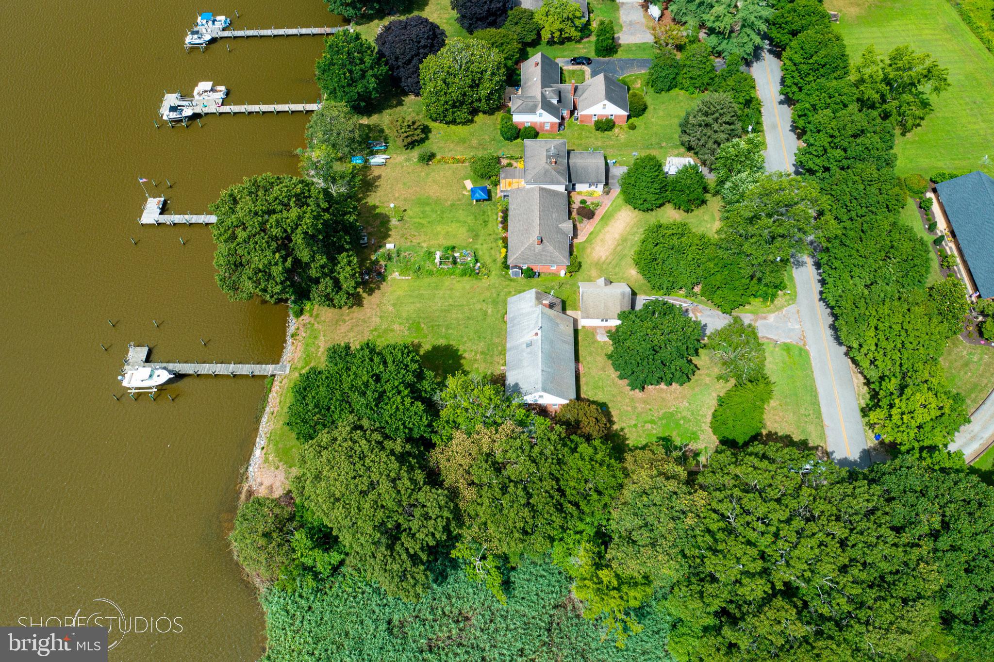 26933 Mallard Road Chestertown, MD 21620 - Photo 13 of 15 an aerial view of a residential houses with yard and swimming pool