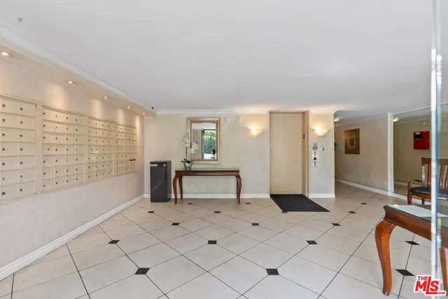 a spacious bathroom with a double vanity sink a mirror and a bathtub