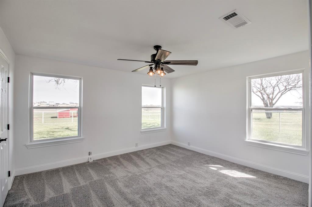 3884 Lois Road East Sanger, TX 76266 - Photo 24 of 40 a view of empty room with windows