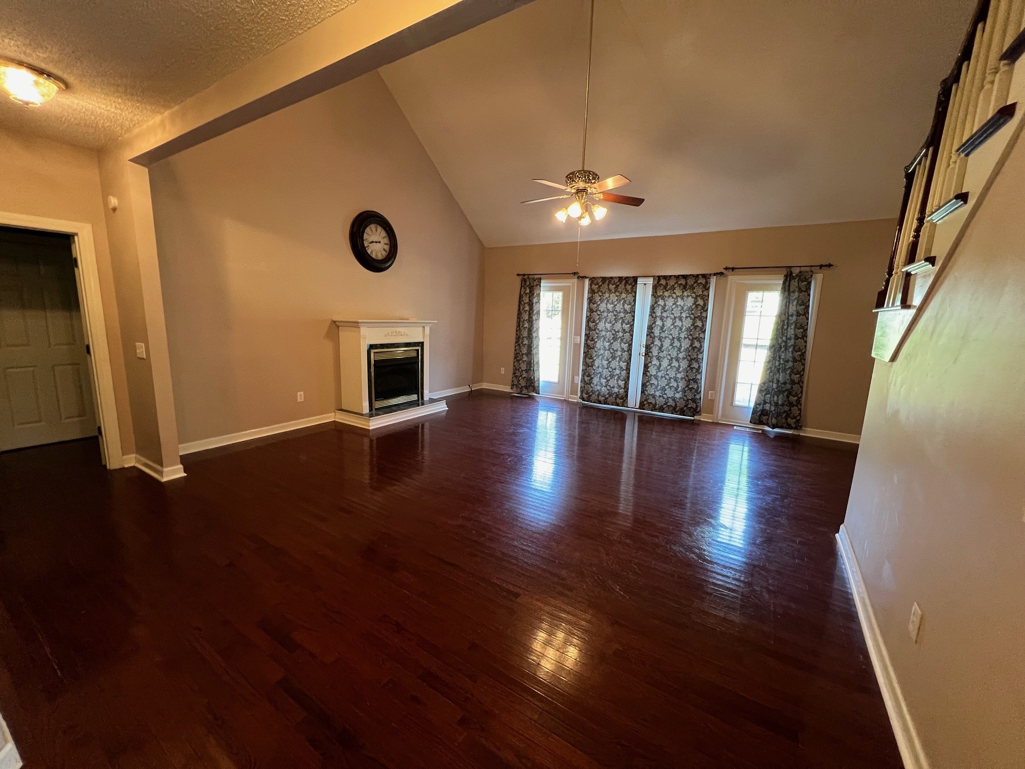 1400 Sumac Road Pulaski, TN 38478 - Photo 12 of 49 an empty room with wooden floor and windows