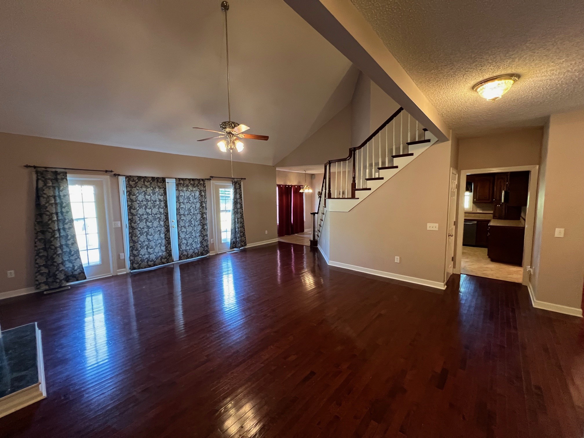1400 Sumac Road Pulaski, TN 38478 - Photo 15 of 49 a view of an empty room with wooden floor and a window