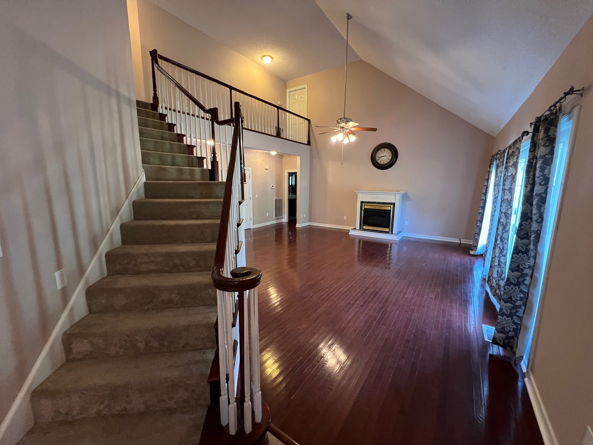 1400 Sumac Road Pulaski, TN 38478 - Photo 16 of 49 a view of a hallway with wooden floor and staircase