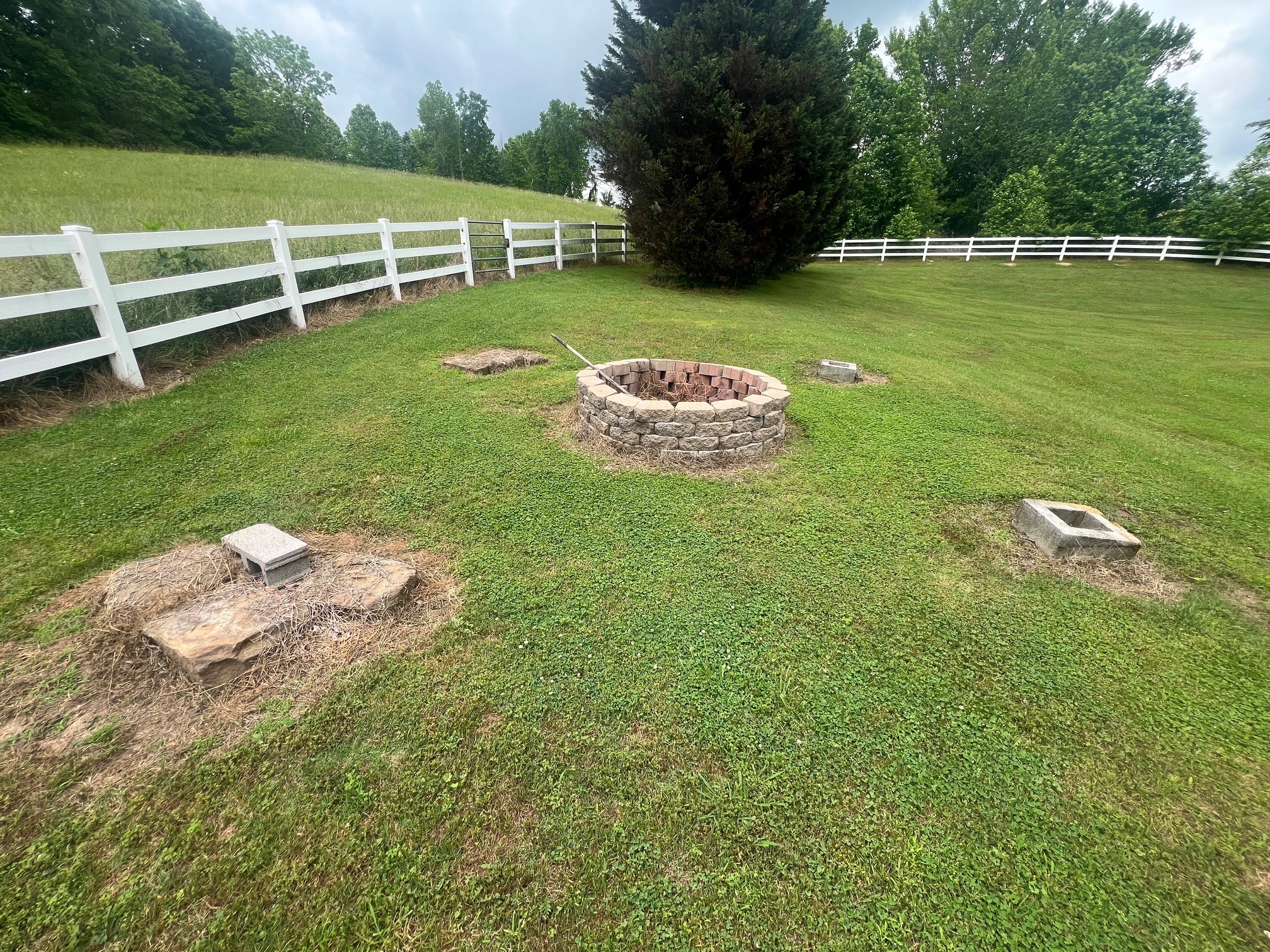 1400 Sumac Road Pulaski, TN 38478 - Photo 46 of 49 a view of a green field with wooden fence