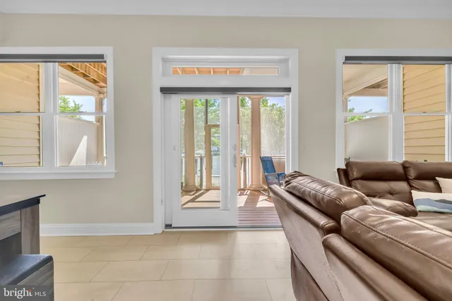 a bathroom with a granite countertop sink toilet a mirror and shower