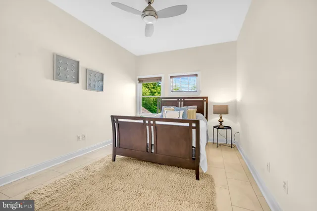 a bedroom with a bed and a cabinets
