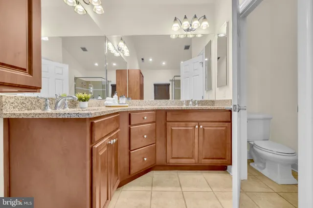 an aerial view of a house with a ocean view
