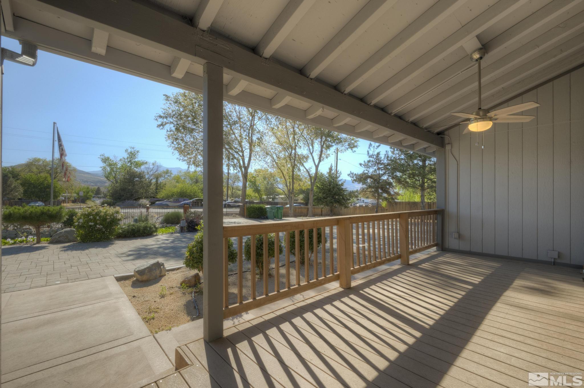 14640 Toll Road Reno, NV 89521 - Photo 5 of 40 a view of a balcony with wooden floor