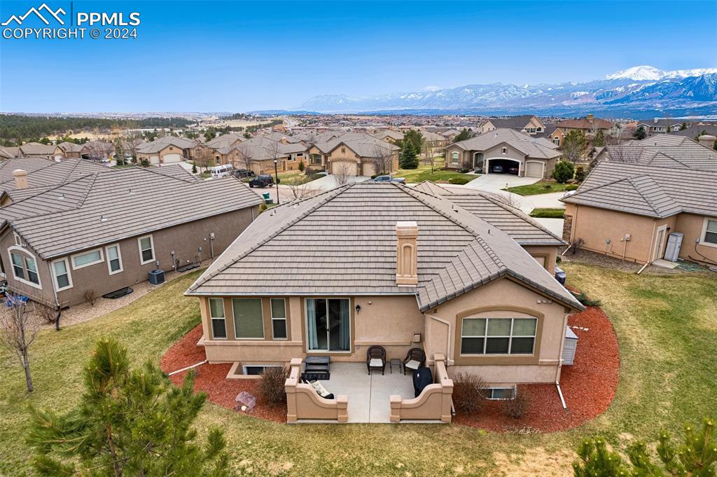 2843 Cinnabar Road Colorado Springs, CO 80921 - Photo 4 of 46 an aerial view of a house with a ocean view