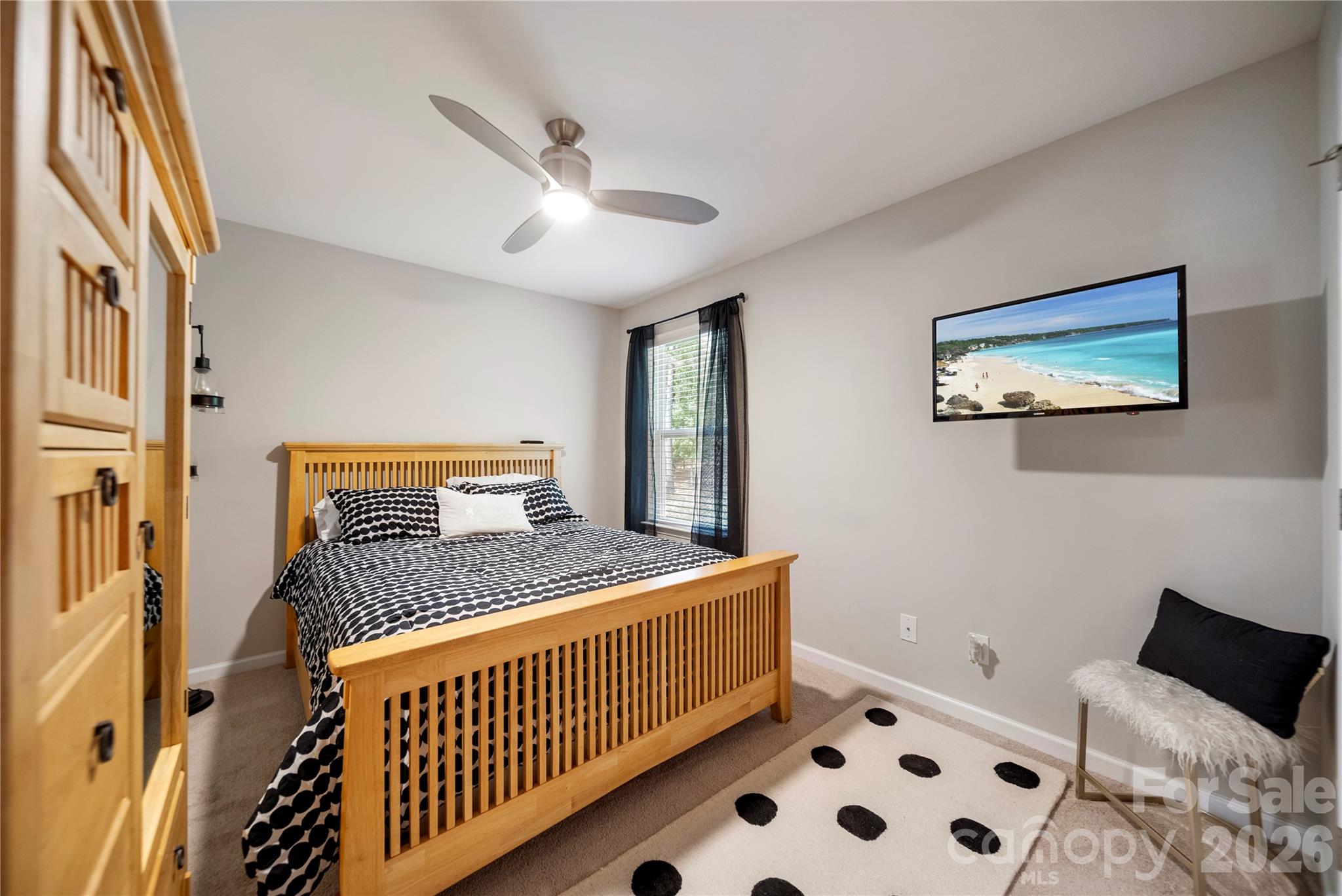 8122 Mossy Rock Road Waxhaw, NC 28173 - Photo 21 of 28 a bedroom with furniture and baby crib