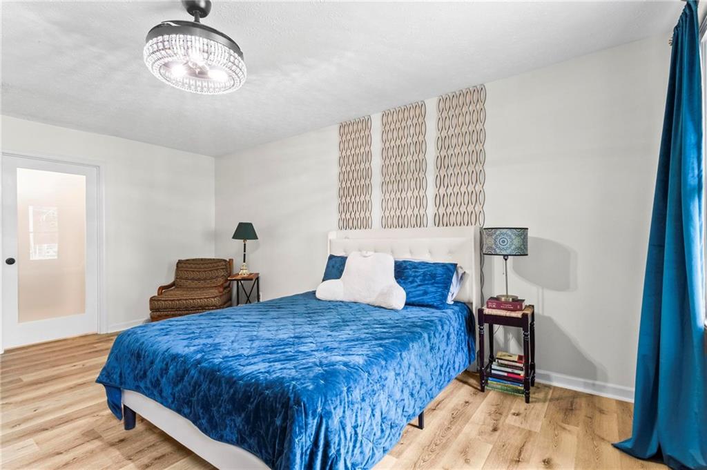 6971 Recreation Lane Acworth, GA 30102 - Photo 13 of 23 a bedroom with a bed and a window