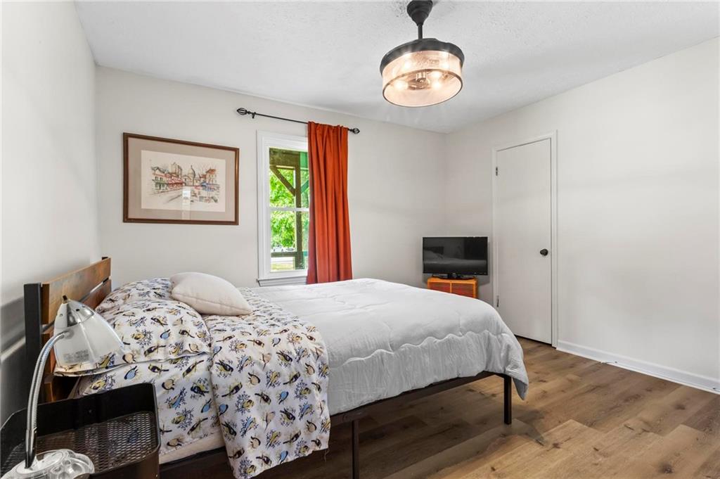 6971 Recreation Lane Acworth, GA 30102 - Photo 16 of 23 a bedroom with a bed and a window