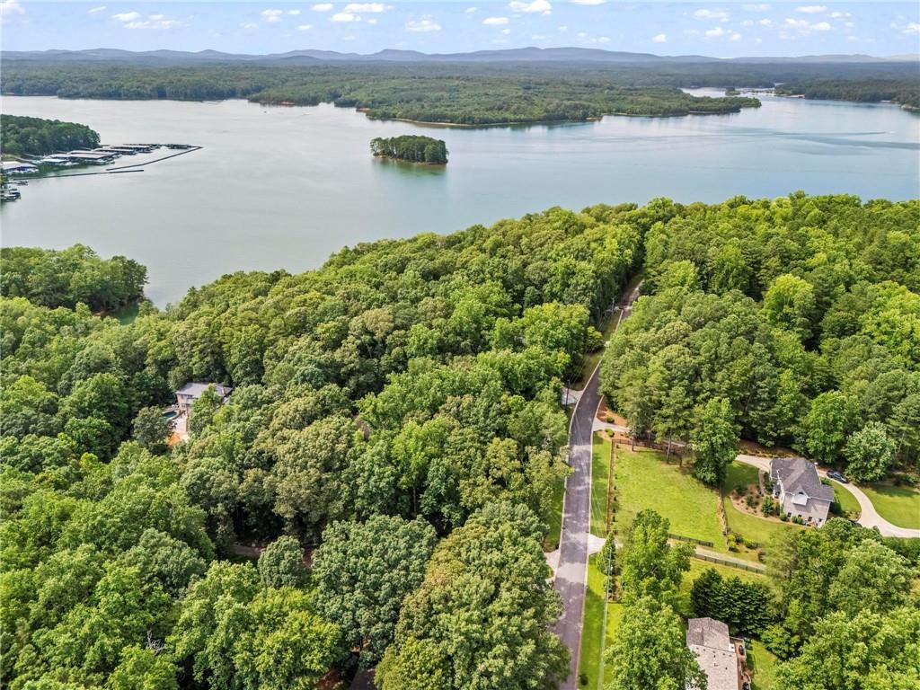 6971 Recreation Lane Acworth, GA 30102 - Photo 20 of 23 a view of a lake from a yard