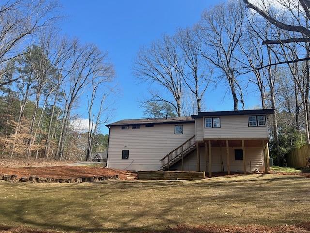 6971 Recreation Lane Acworth, GA 30102 - Photo 21 of 23 a front view of a house with a yard