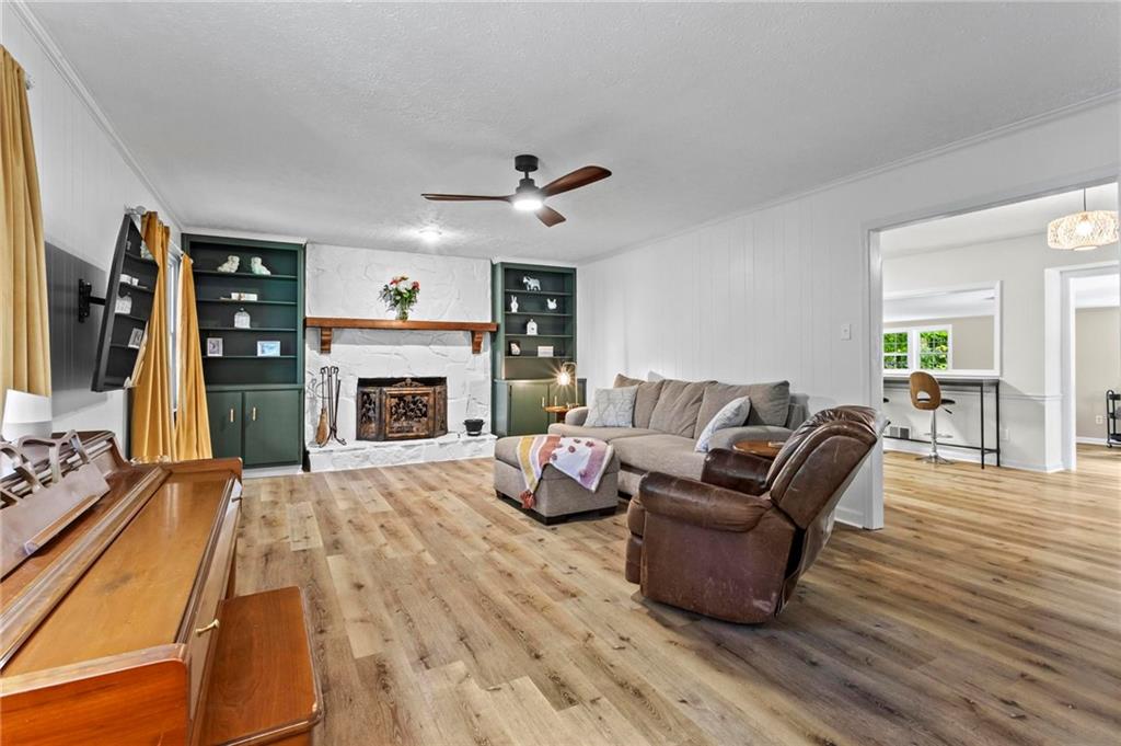6971 Recreation Lane Acworth, GA 30102 - Photo 4 of 23 a living room with furniture and a fireplace