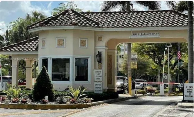 a front view of a house with a large window
