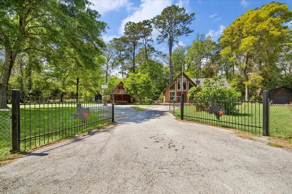a view of road and grass