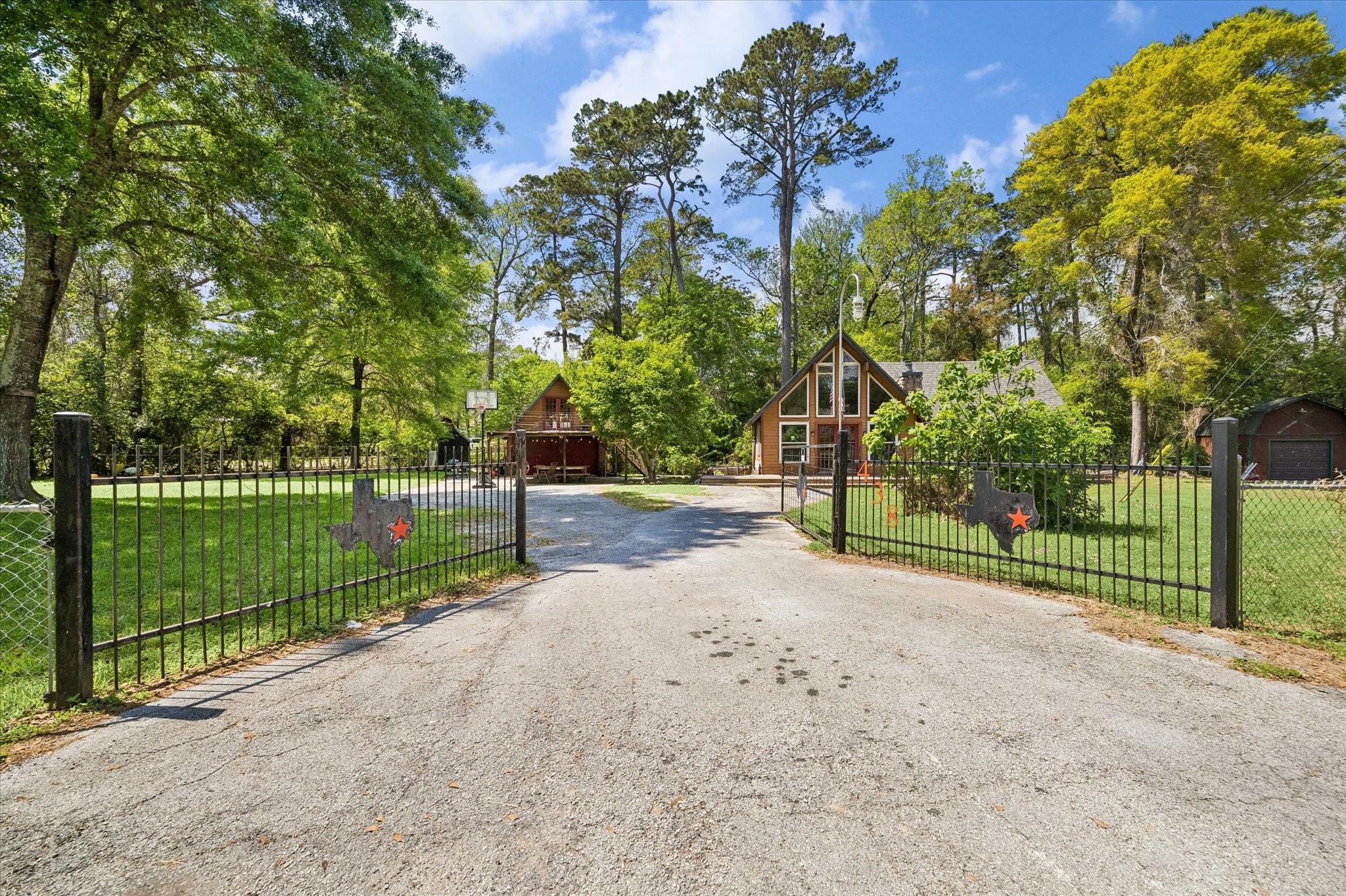 438 Havard Road, Unit 2 Huffman, TX 77336 - Photo 1 of 10 a view of road and grass