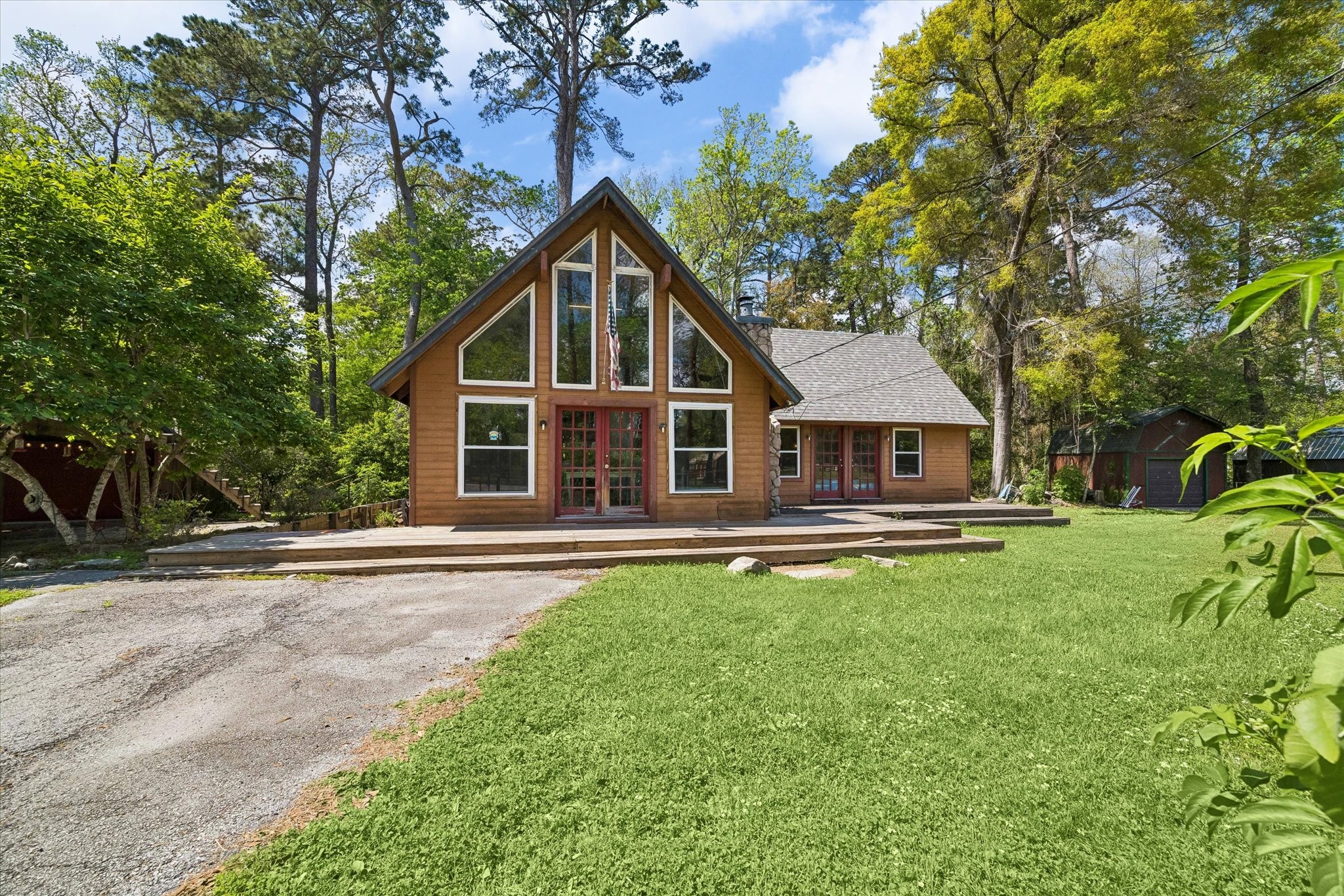 438 Havard Road, Unit 2 Huffman, TX 77336 - Photo 2 of 10 a front view of a house with a garden