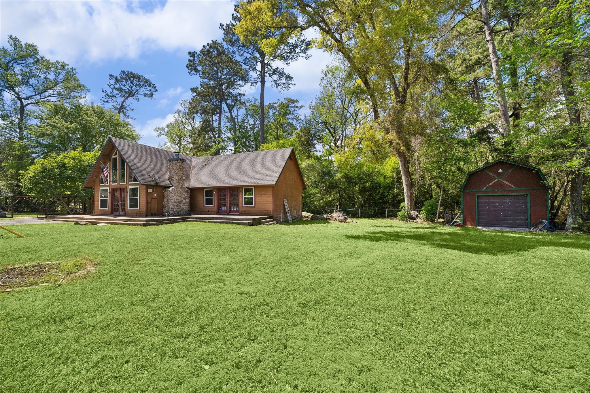 438 Havard Road, Unit 2 Huffman, TX 77336 - Photo 3 of 10 a front view of a house with garden